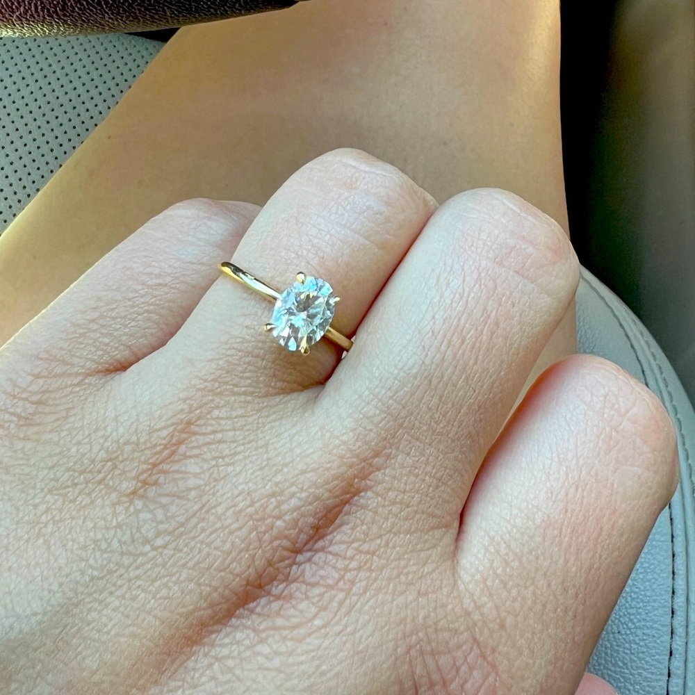 1.5 oval engagement ring. Moissanite